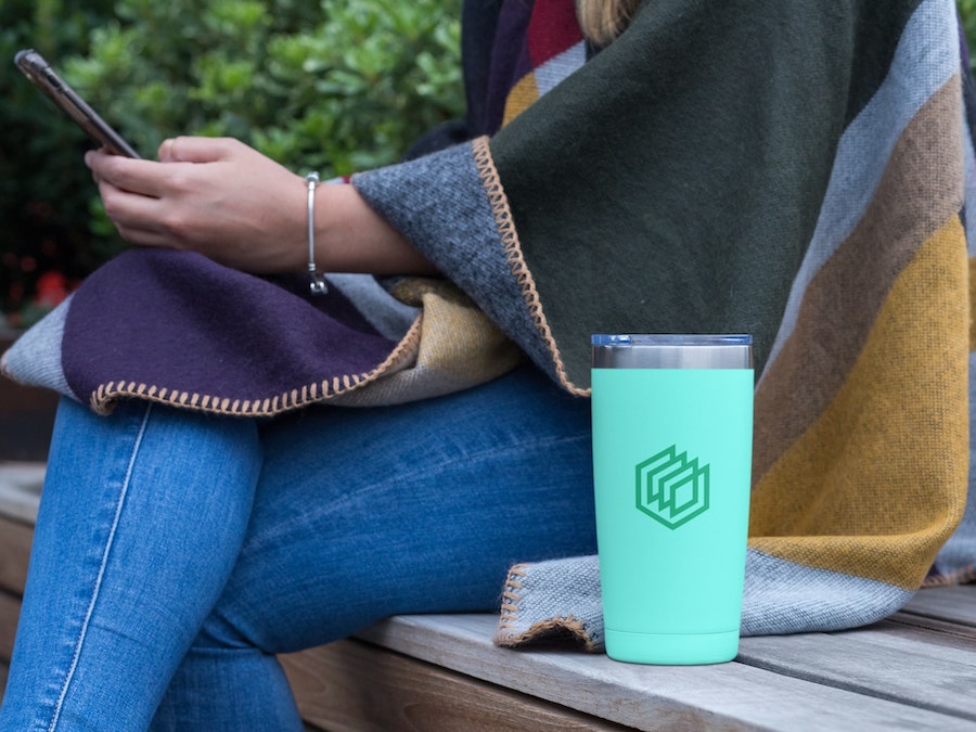 https://designhub.co/wp-content/uploads/2023/05/travel-mug-tumbler-mockup-from-Placeit.jpg